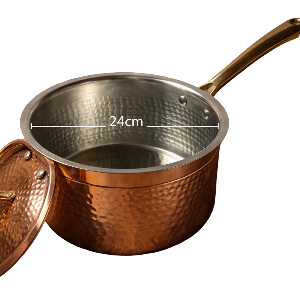 Hammered copper saucepan with brass handle and lid