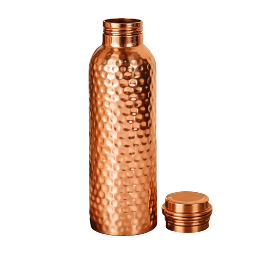 Pure copper hand-hammered water bottle with a shiny polish finish.